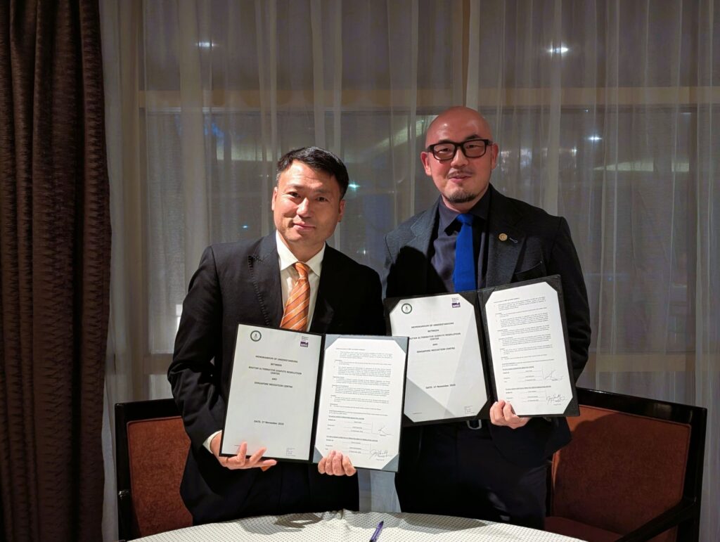 SMC and Bhutan ADR Center representatives at the MOU signing