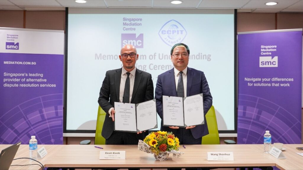 SMC and CCPIT representatives at the MOU signing